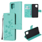 Läderfodral med fjärilsmotiv och blommor för Samsung Galaxy A12