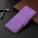 Ensfarvet Litchi-tekstur Wallet Stand Lædercover med Rem til Samsung Galaxy A22 5G (EU Version)