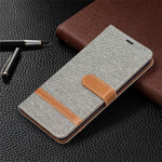 For Samsung Galaxy S22+ 5G Drop-proof Splicing Jeans Cloth Magnetic Clasp Stand PU Leather Wallet Leather Phone Case