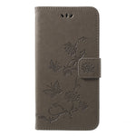 Läderfodral med fjärilsmotiv och blommotiv för Huawei P20 Pro