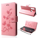 Läderfodral med fjärilsmotiv och blommotiv för Huawei P30 Lite