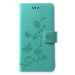 Läderfodral med fjärilsmotiv och blommotiv för Huawei P30 Lite