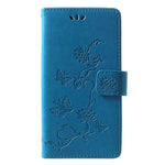 Läderfodral med fjärilsmotiv och blommotiv för Huawei P30 Lite