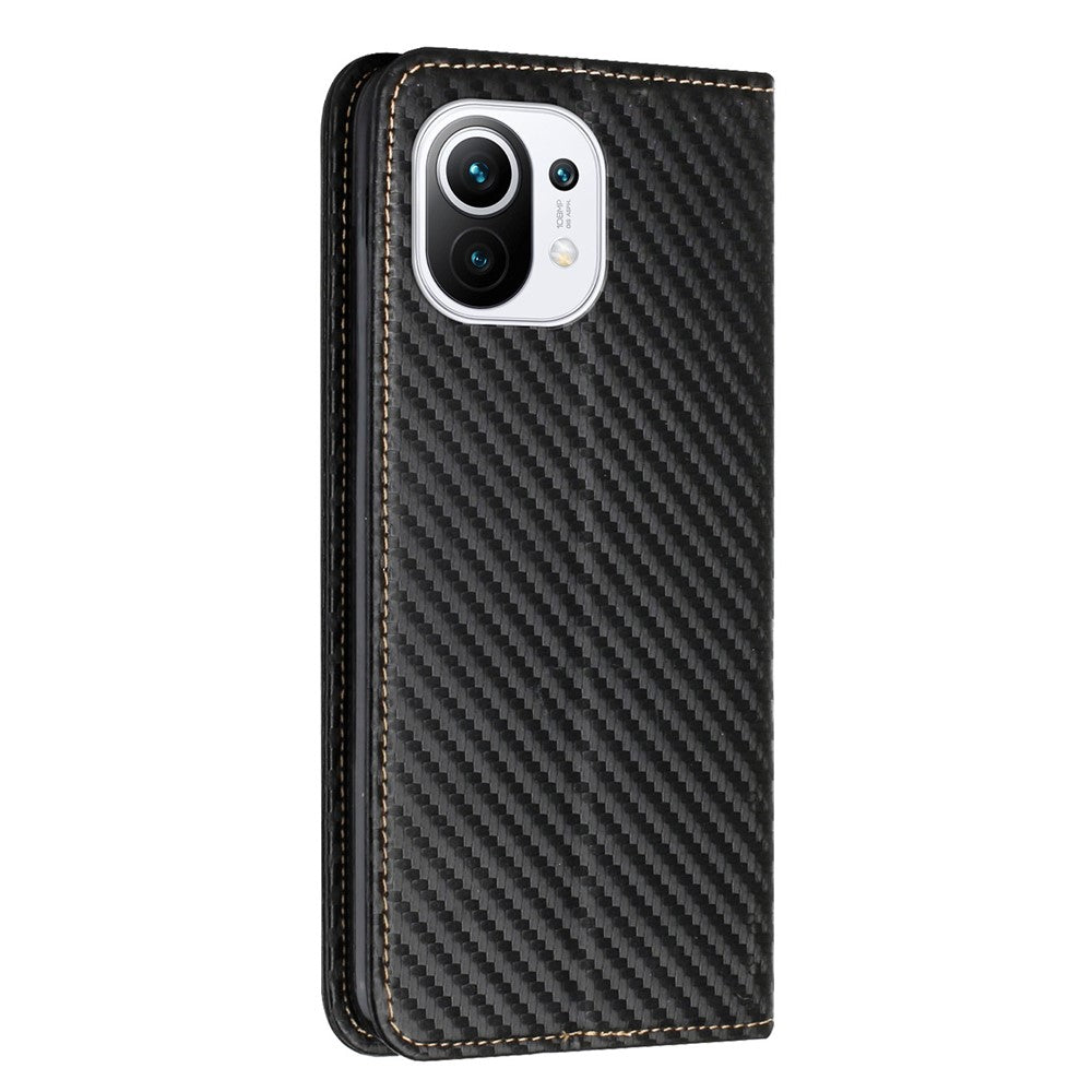 Flip Magnetic Auto-absorbed Carbon Fiber Texture Anti-fall Stand Wallet PU Leather Case Cover with Hand Strap for Xiaomi Mi 11
