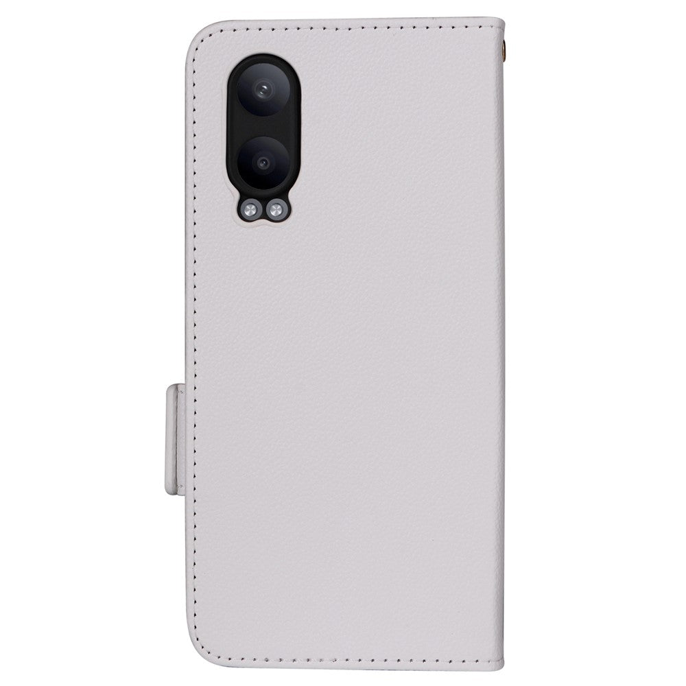 OnePlus Nord CE4 Lite 5G / Oppo K12x 5G (Kina) fodral med handledsrem litchitextur PU-läder plånboksfodral