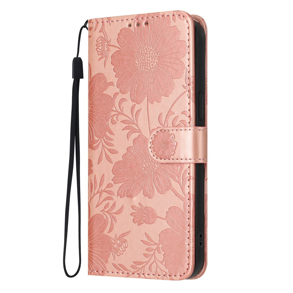 Pungcover til iPhone 17e / 16e med blomsterprint, PU-læder, standerfunktion og håndledsrem