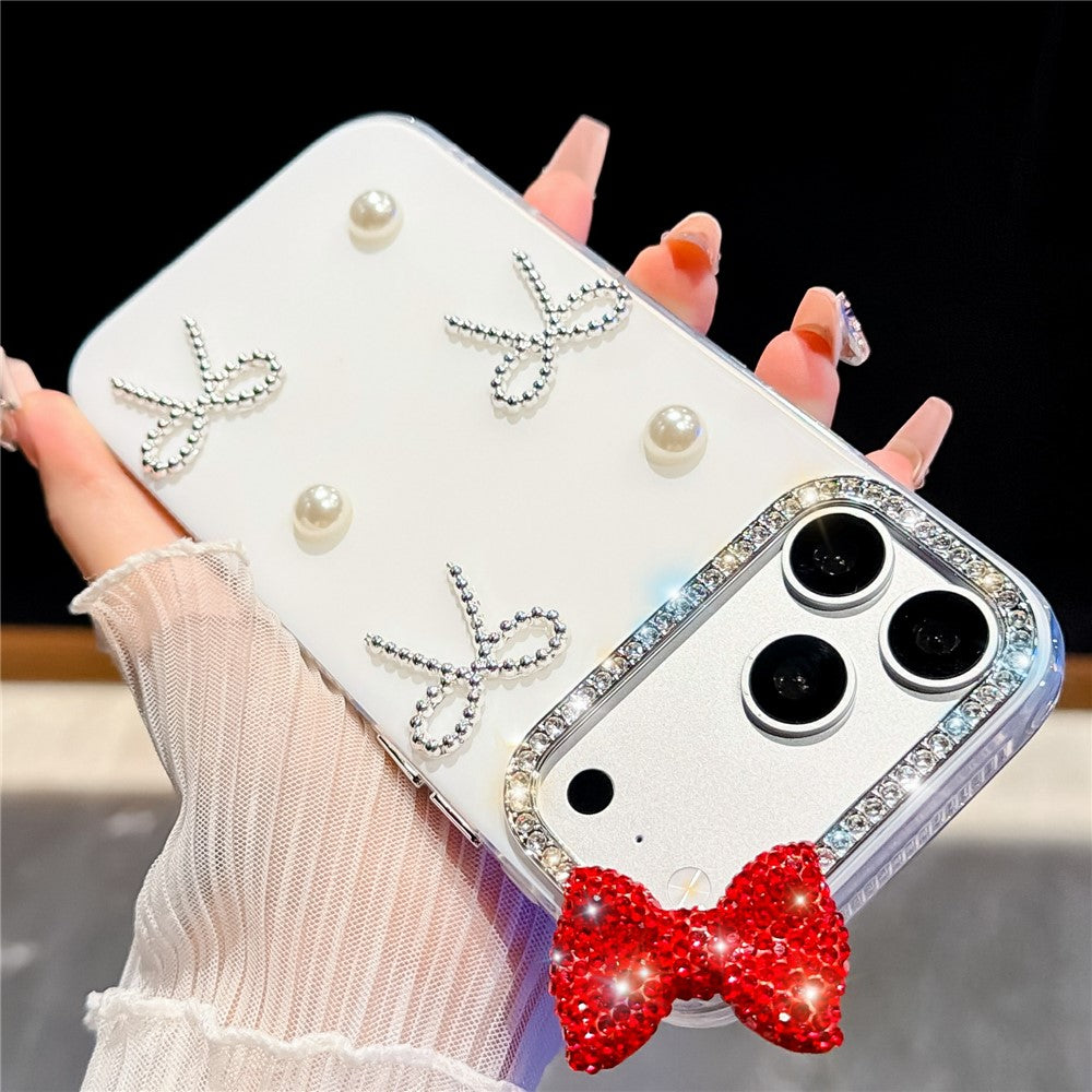 For iPhone 18 Pro / 17 Pro Case Pearl Bow Decor PC + TPU IMD Phone Cover with Rhinestone Camera Ring