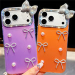 For iPhone 18 Pro / 17 Pro Case Pearl Bow Decor PC + TPU IMD Phone Cover with Rhinestone Camera Ring