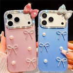 For iPhone 18 Pro / 17 Pro Case Pearl Bow Decor PC + TPU IMD Phone Cover with Rhinestone Camera Ring