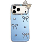 For iPhone 18 Pro / 17 Pro Case Pearl Bow Decor PC + TPU IMD Phone Cover with Rhinestone Camera Ring