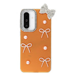 For Samsung Galaxy S25 Case Pearl Bow Decor PC + TPU IMD Phone Cover with Rhinestone Camera Ring