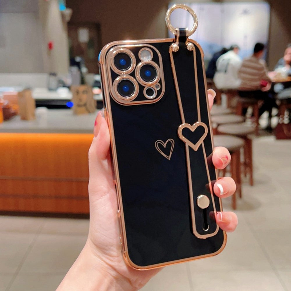 Til iPhone 16 Pro Max Etui Elektropletteret Hjerte Mønster TPU Telefon Bagcover med Armbånds-stativ