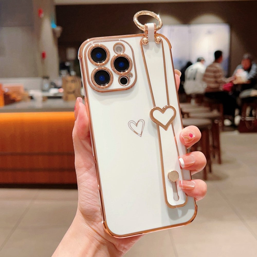 For iPhone 16 Pro Case Electroplated Heart Pattern TPU Phone Back Cover with Wristband Kickstand