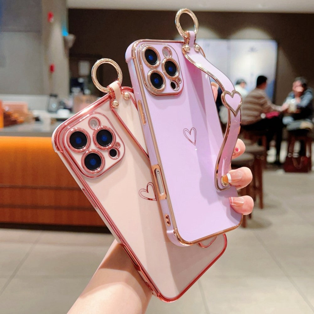 For iPhone 16 Pro Case Electroplated Heart Pattern TPU Phone Back Cover with Wristband Kickstand