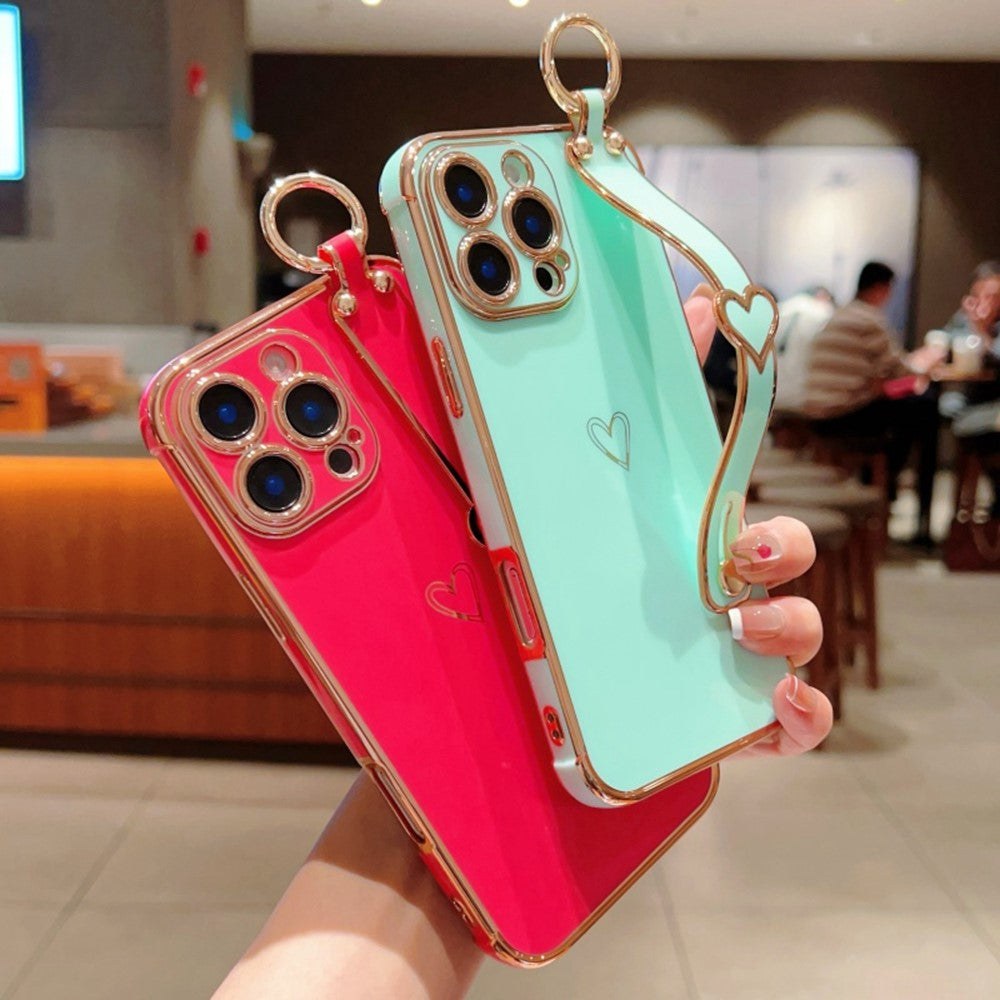 For iPhone 16 Pro Case Electroplated Heart Pattern TPU Phone Back Cover with Wristband Kickstand
