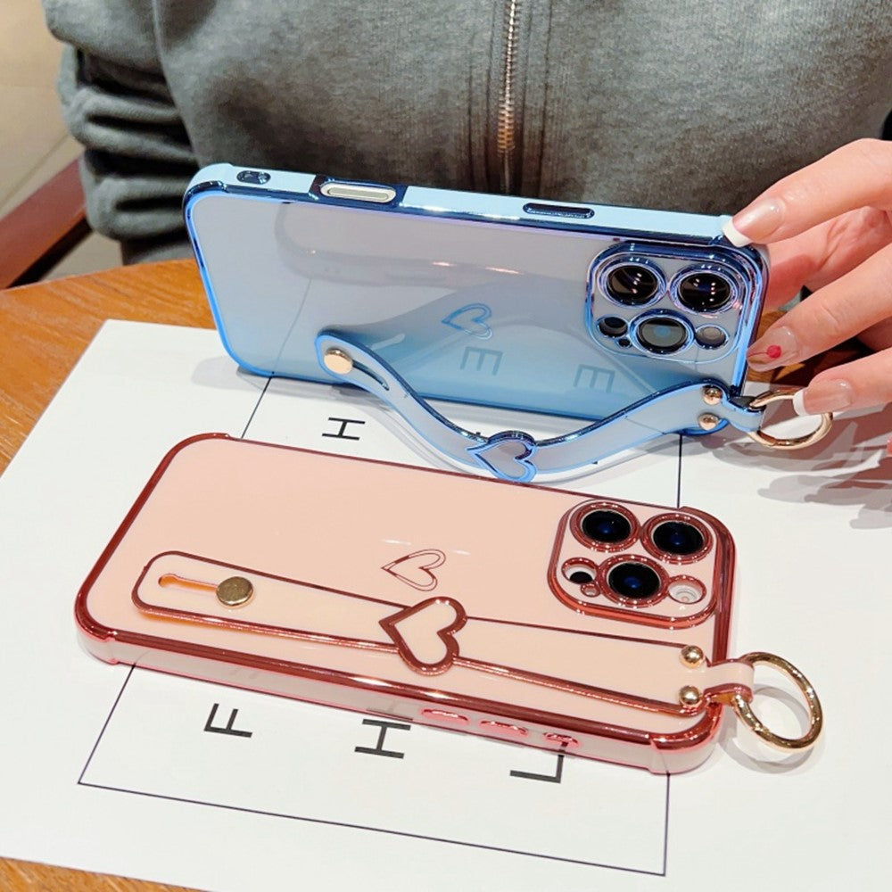For iPhone 16 Pro Case Electroplated Heart Pattern TPU Phone Back Cover with Wristband Kickstand