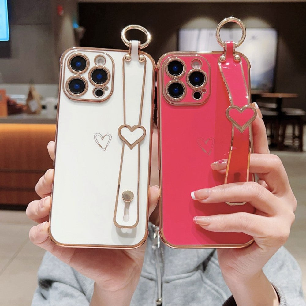 For iPhone 16 Pro Case Electroplated Heart Pattern TPU Phone Back Cover with Wristband Kickstand