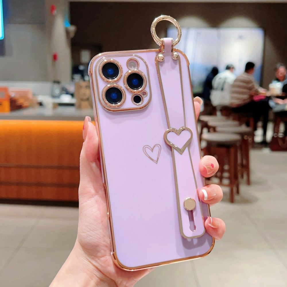 For iPhone 16 Pro Case Electroplated Heart Pattern TPU Phone Back Cover with Wristband Kickstand
