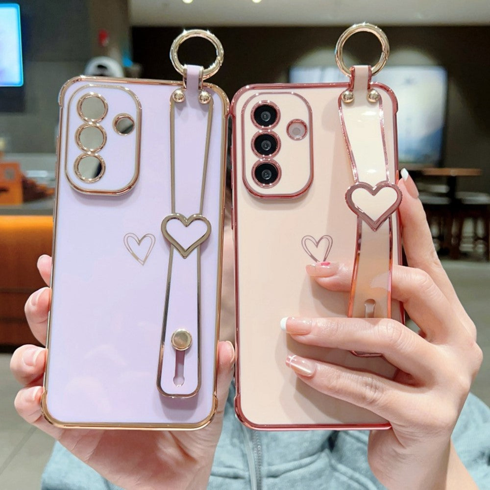 Til Samsung Galaxy A36 5G / A56 5G etui elektrobelagt hjerte mønster TPU telefonbagcover med håndledsrem/stativ