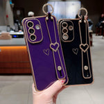 Til Samsung Galaxy A36 5G / A56 5G etui elektrobelagt hjerte mønster TPU telefonbagcover med håndledsrem/stativ