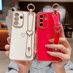 Til Samsung Galaxy A36 5G / A56 5G etui elektrobelagt hjerte mønster TPU telefonbagcover med håndledsrem/stativ
