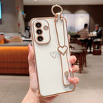 Til Samsung Galaxy A36 5G / A56 5G etui elektrobelagt hjerte mønster TPU telefonbagcover med håndledsrem/stativ
