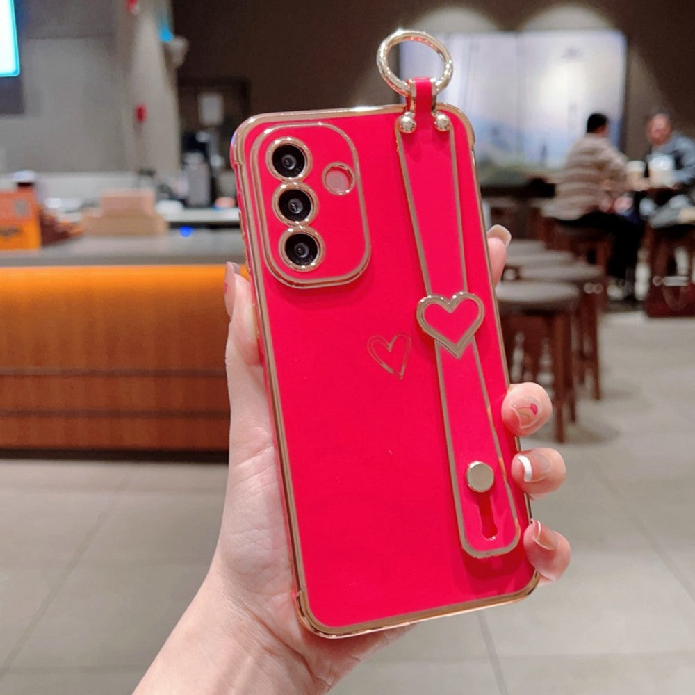 Til Samsung Galaxy A36 5G / A56 5G etui elektrobelagt hjerte mønster TPU telefonbagcover med håndledsrem/stativ