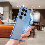 Samsung Galaxy S24 Ultra-cover med hjerte, håndledsrem og stativ, elektropletteret TPU-mobilcover