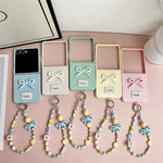 For Samsung Galaxy Z Flip7 5G Case 3D Bow Soft Touch Hard PC Phone Cover with Beaded Bracelet Strap