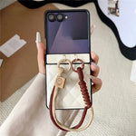 For Samsung Galaxy Z Flip7 5G Case Air Cushion V-Pattern Diamond Grid Leather + PC Phone Cover with Lanyard
