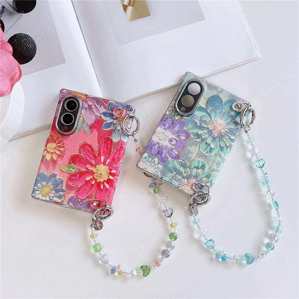 Samsung Galaxy Z Fold8-skal med oljemålning och blommigt motiv, med avtagbar handrem i kristallpärlor