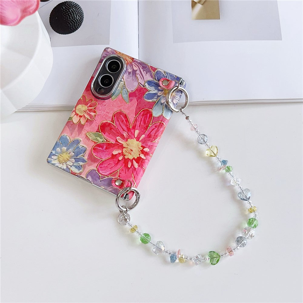 Samsung Galaxy Z Fold8-skal med oljemålning och blommigt motiv, med avtagbar handrem i kristallpärlor