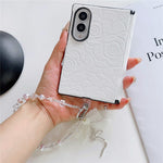 For Samsung Galaxy Z Fold8 cover præget kameliemønster PU-læder telefoncover med blonde perlearmbånd
