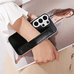 For Samsung Galaxy S24 Ultra Case PU Leather Coated PC + TPU Protective Phone Cover with Quilted Wrist Strap