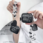 For AirPods 4 Protective Case Black Shell Texture TPU Earphone Cover with Heart Beaded Wrist Strap Chain
