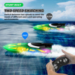 V777 2.4G Remote Control Stunt Boat Toy with 2 Batteries High Speed Electric RC Boat with RGB LED Light for Children